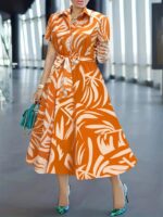 Orange floral print button front dress for women Casual short sleeve collared floral dress Qatar Summer A-line floral dress women Eshopeei Qatar