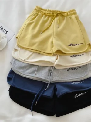 Women's loose fit casual sports shorts yellow summer shorts Qatar