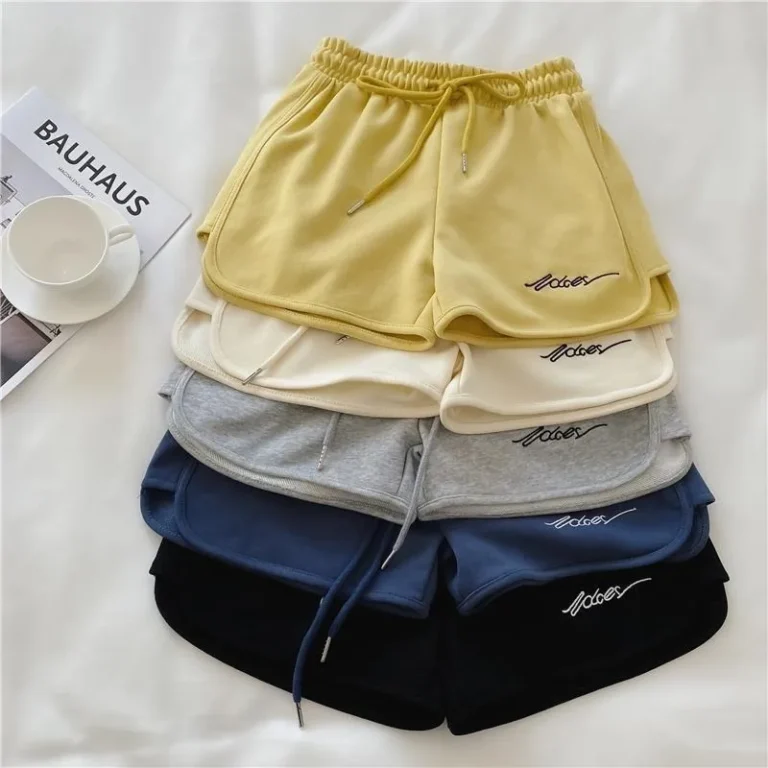 Women's loose fit casual sports shorts yellow summer shorts Qatar